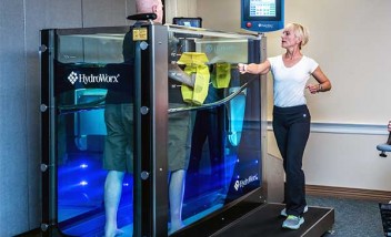 Person Using HydroWorx 300 with Trainer