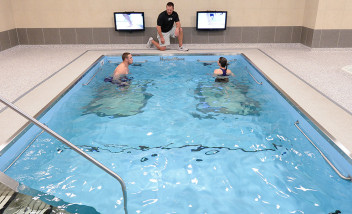 Two People training in therapy pool