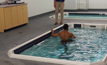 Person stretching in HydroWorx pool
