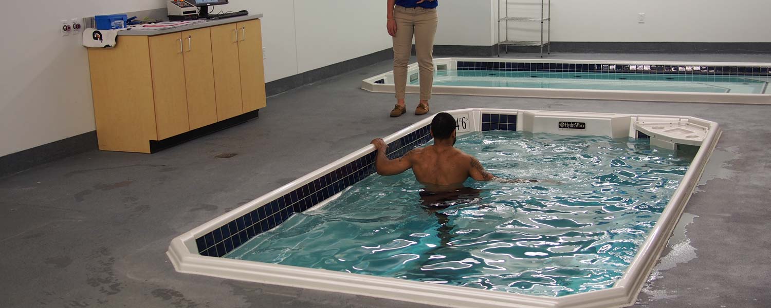 Person stretching in HydroWorx pool