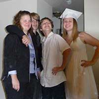 Family posing for a photo indoors