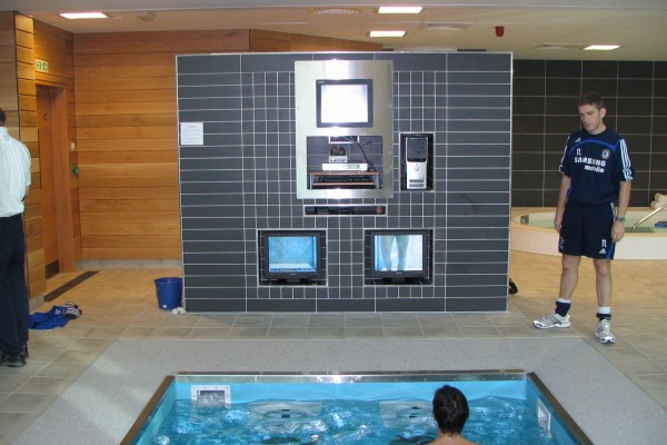 Trainer and Trainee using HydroWorx pool equipment