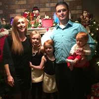 Cooley Family posing for photo during Christmas