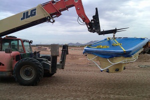 Forklift carrying pool equipment