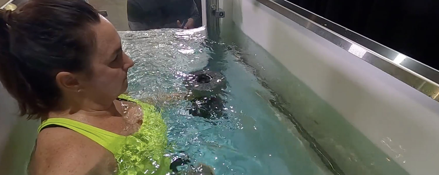 Woman training in HydroWorx EVO