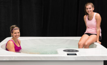 two young women using THRIVE Plunge