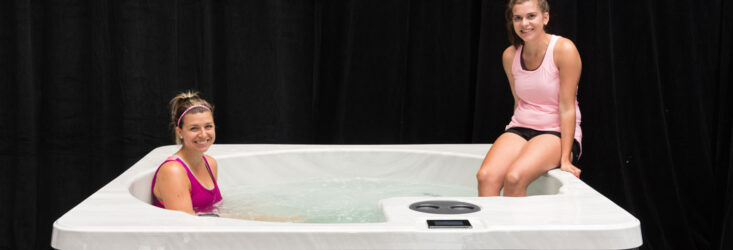 two young women using THRIVE Plunge