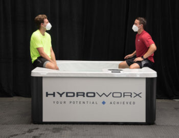 two young men using THRIVE Plunge