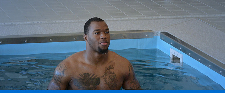 Man enjoying a hydrotherapy pool from HydroWorx