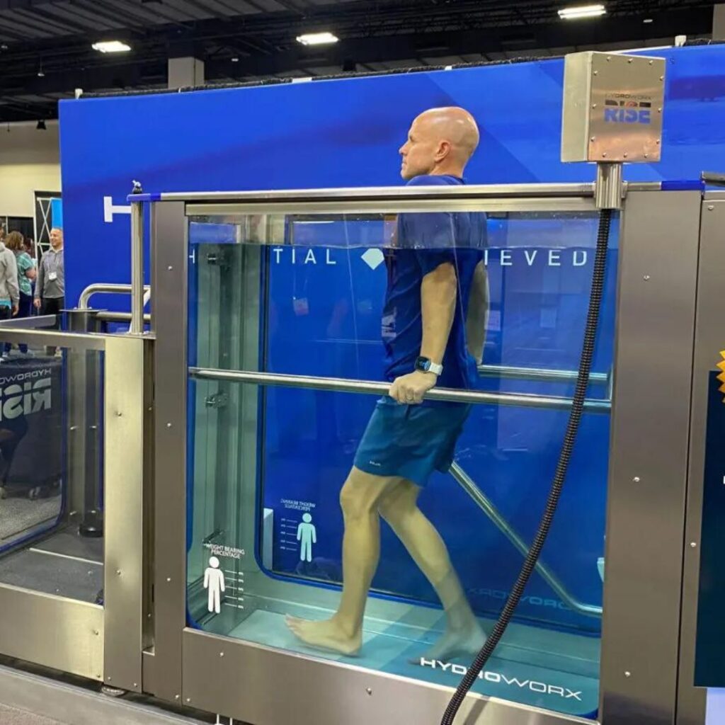 man walking in HydroWorx pool