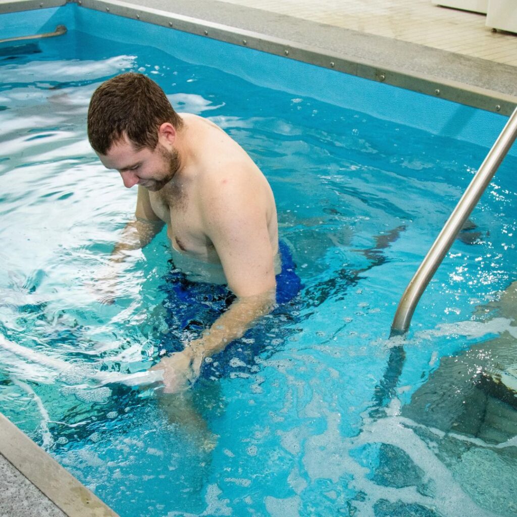 man in a HydroWorx pool